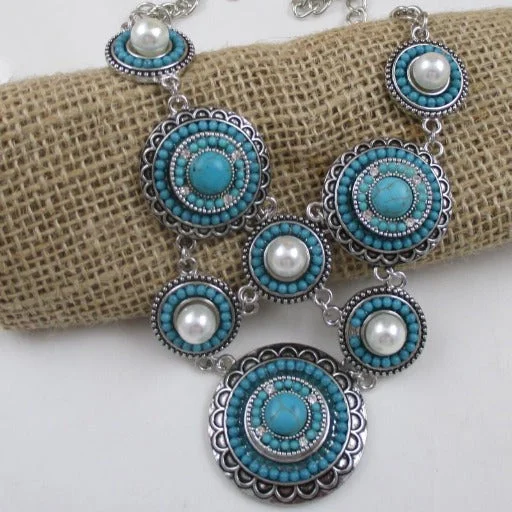 Beautiful necklaces and pendants with diamond halo settings for extra brilliance-Turquoise Pearl & Silver Boho Multi Charm Necklace