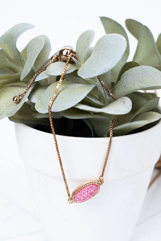 Bangles with personalized initial charm engravings -Crystal Avenue Worn Goldtone and Pink Druzy Adjustable Bracelet