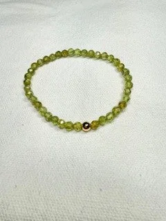 Bangles with chunky designs for statement wear -Peridot Faceted Bracelet with Gold Filled Bead