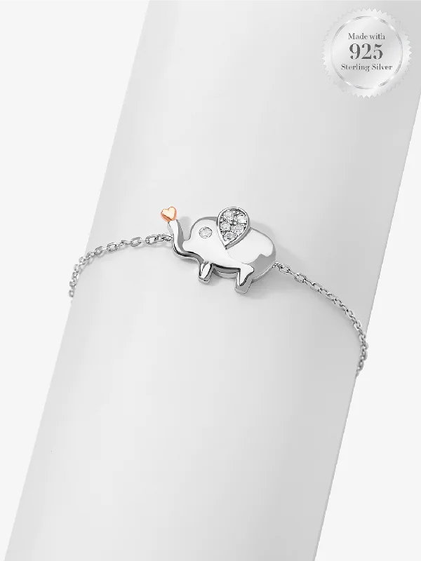 Rose gold bracelets with sleek minimalist designs -Love Trunk Two Tone Elephant Bracelet