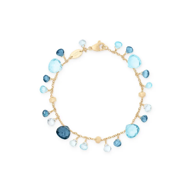 Bangles with blue quartz for cool tones -Marco Bicego Paradise Single Strand Blue Topaz and London Blue Topaz Bracelet